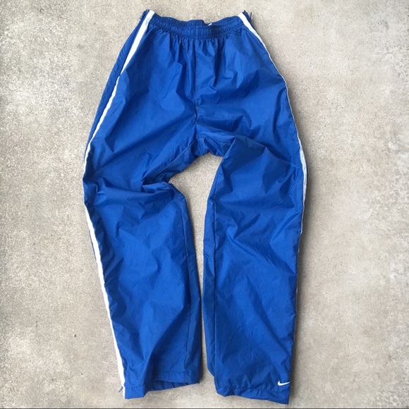 blue nike windbreaker pants